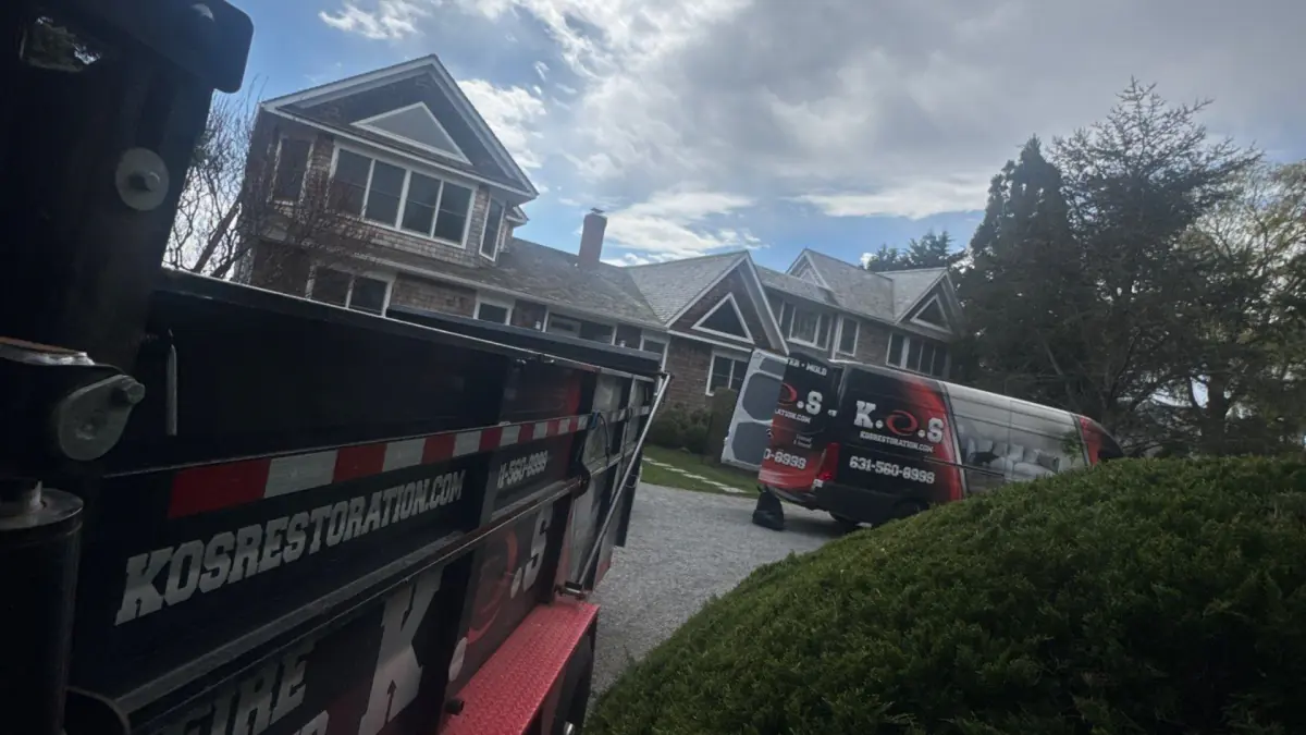 K.O.S. truck at a waterfront Hamptons home for crawlspace mold remediation