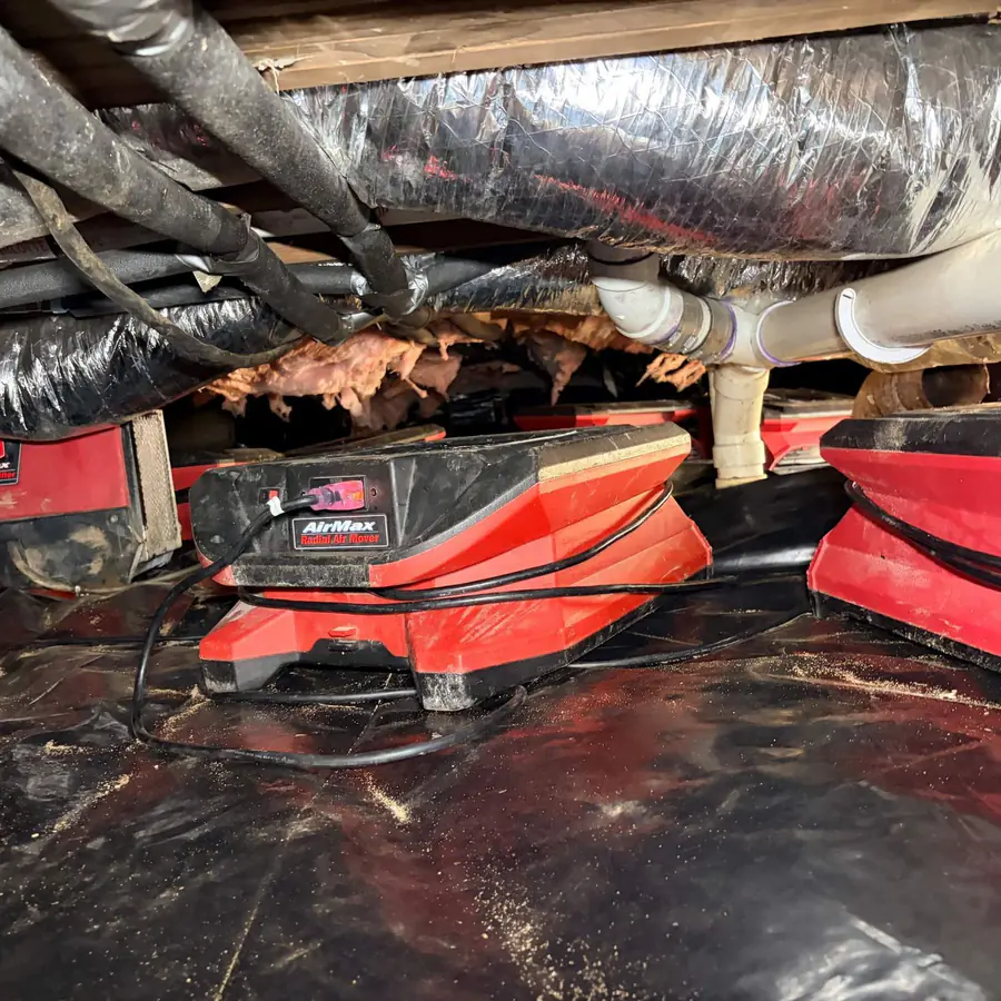 Drying and dehumidification equipment running in the crawlspace