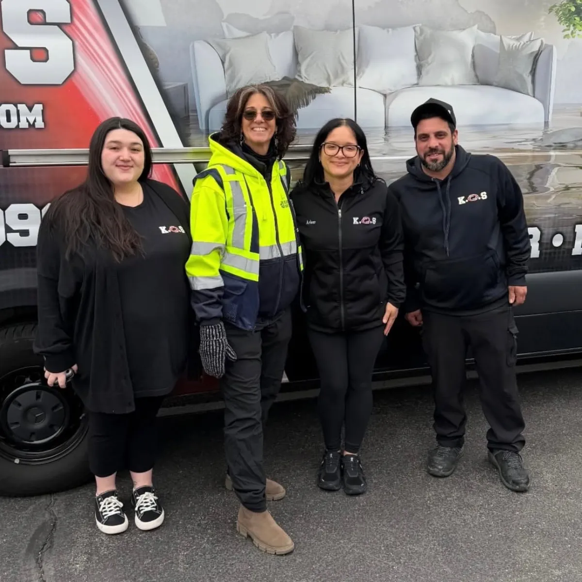 K.O.S. Restoration team in front of a company van at the Island Harvest Turkey Drive