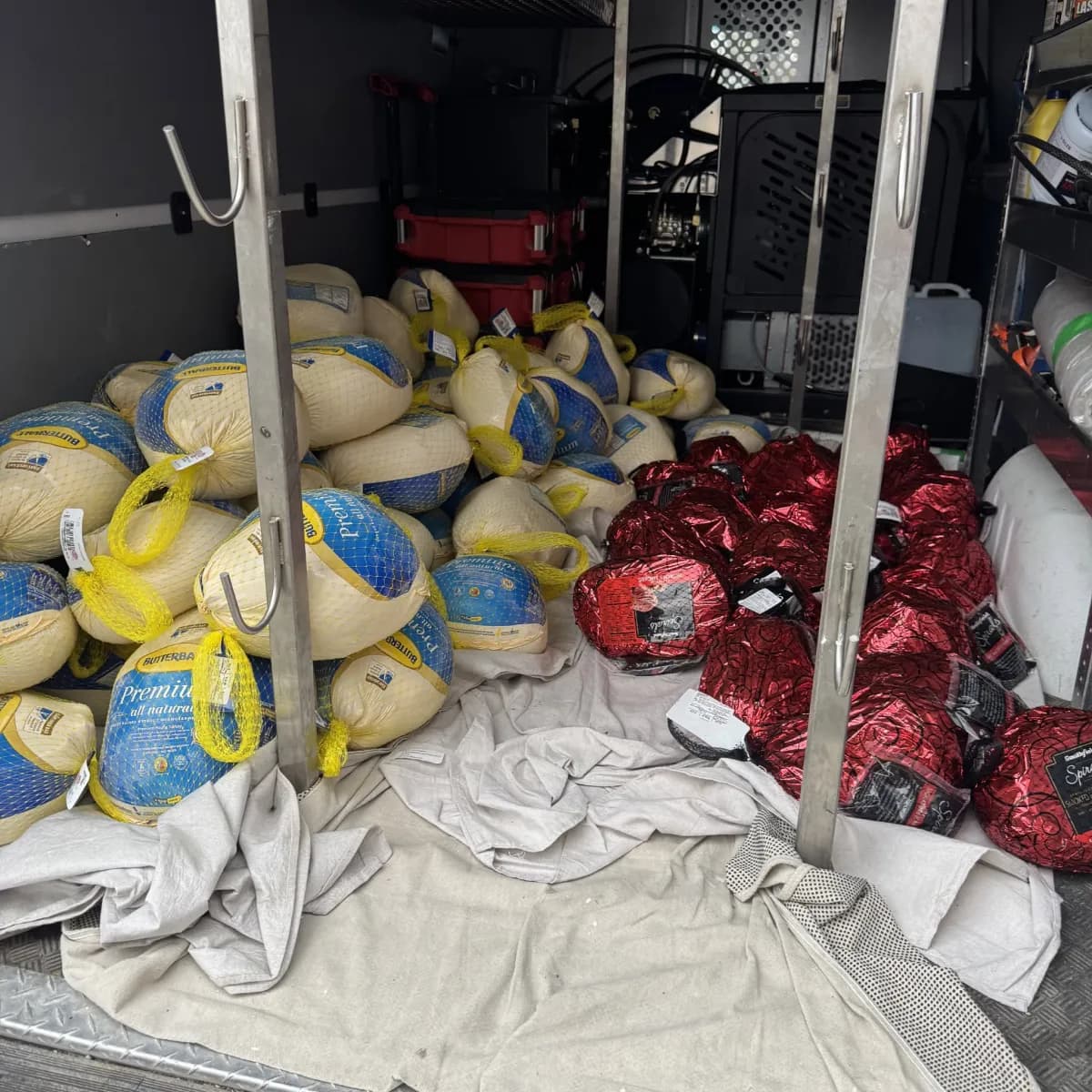 K.O.S. Restoration van loaded with donated turkeys and hams