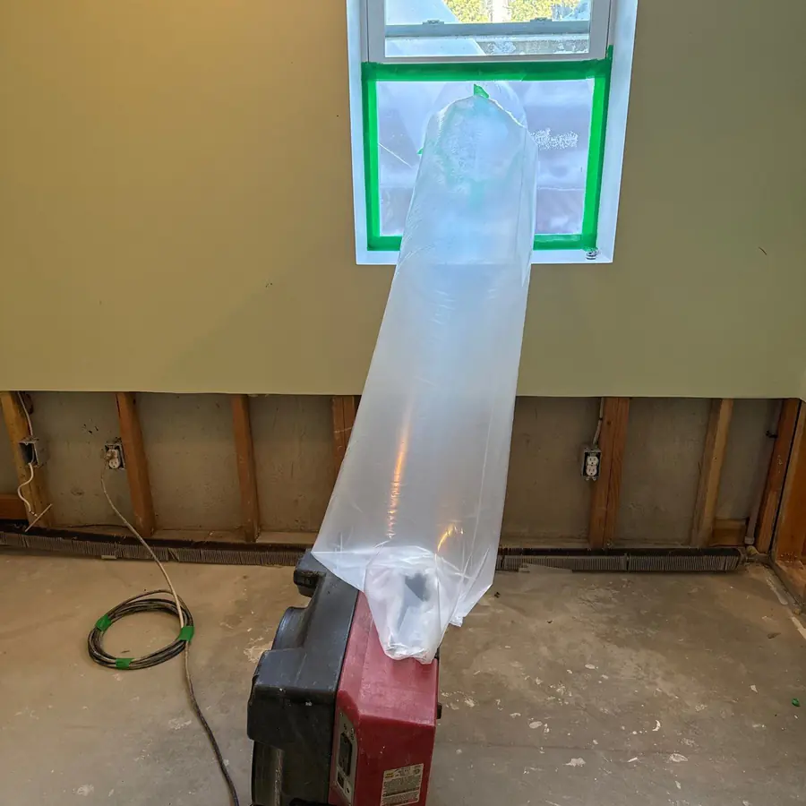 HEPA air scrubber running during basement mold remediation in Westhampton