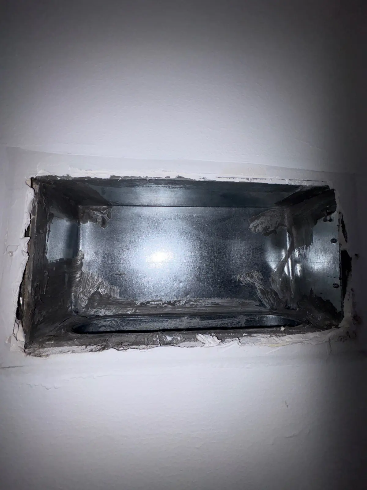 The same register opening back to bare metal after air duct cleaning, East Patchogue