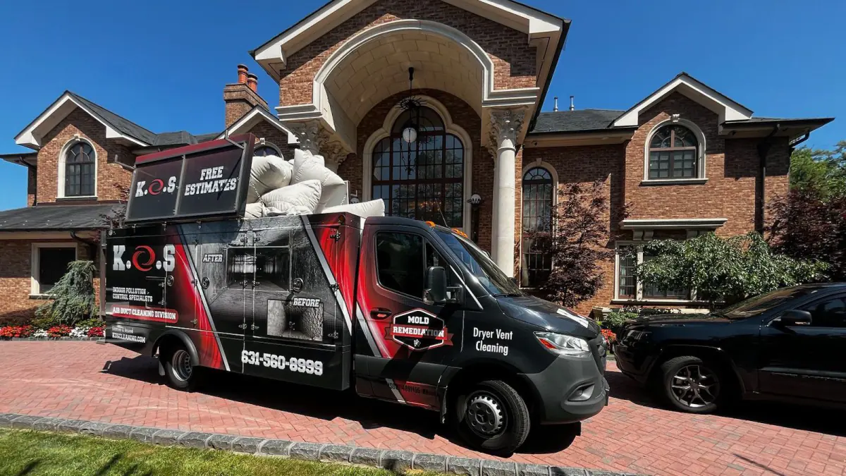 K.O.S. Restoration air duct cleaning truck with its truck-mounted HEPA system at a Long Island home