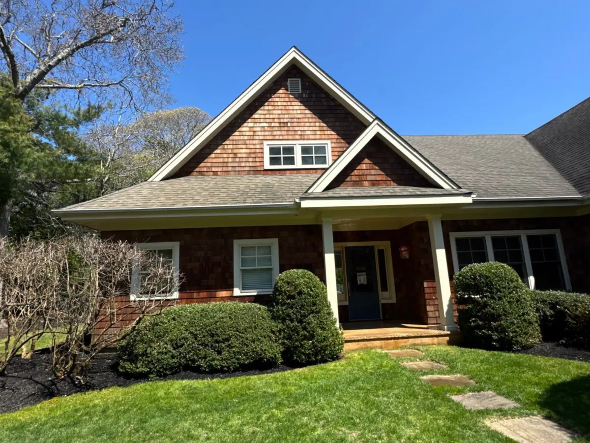 Front of the Westhampton cedar shake home after soft washing