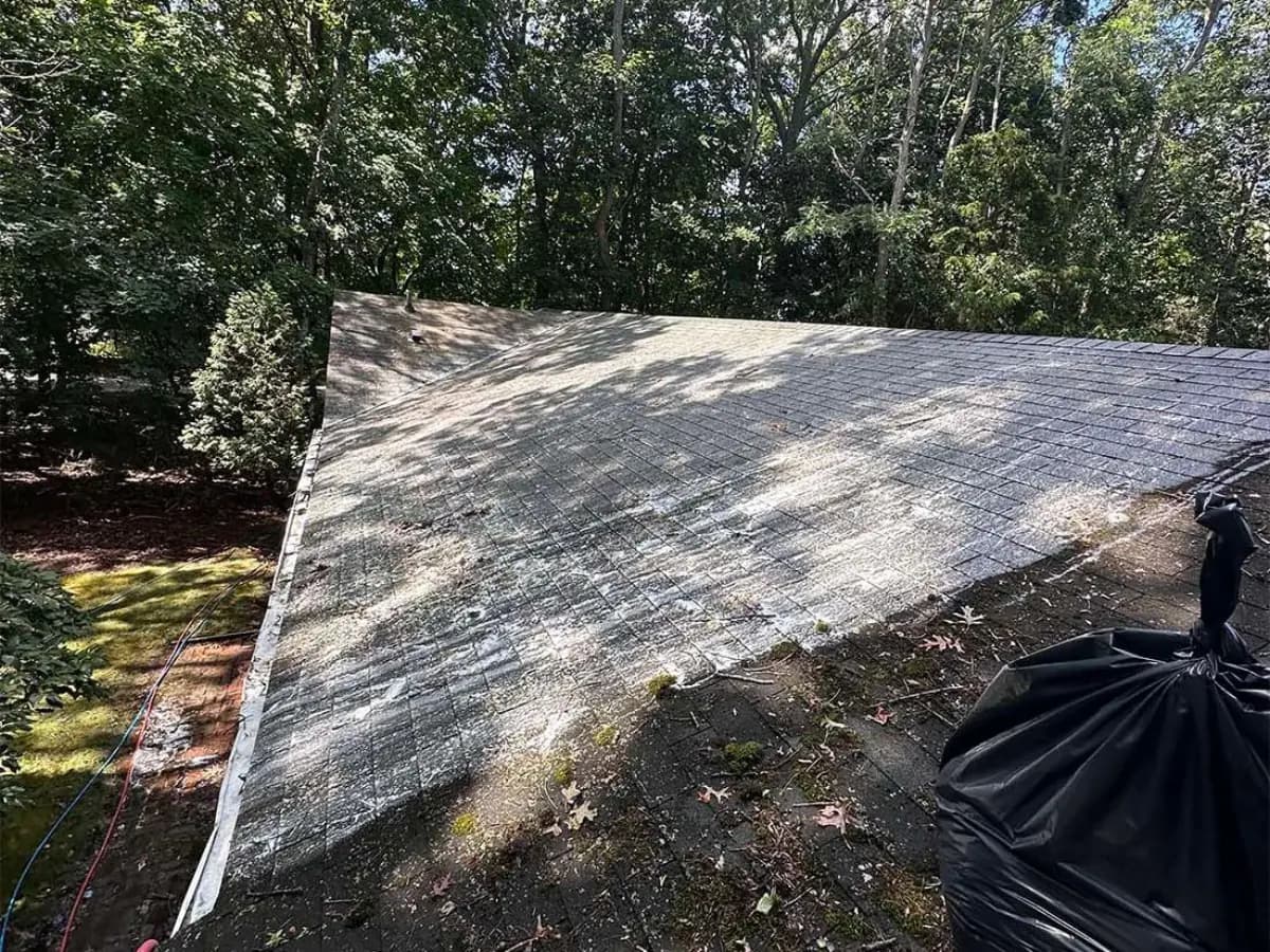 Asphalt roof mid soft wash, algae streaks lifting