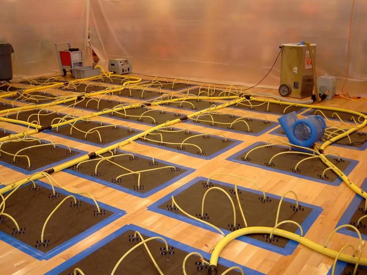 dry-hardwood-floors-quickly using state of the art water damage restoration technology by K.O.S.
