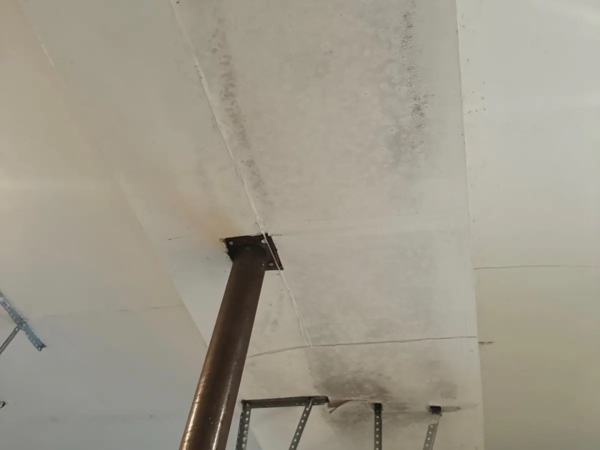mold growth in garage from water damage. K.O.S. offers water damage restoration services on Long Island.