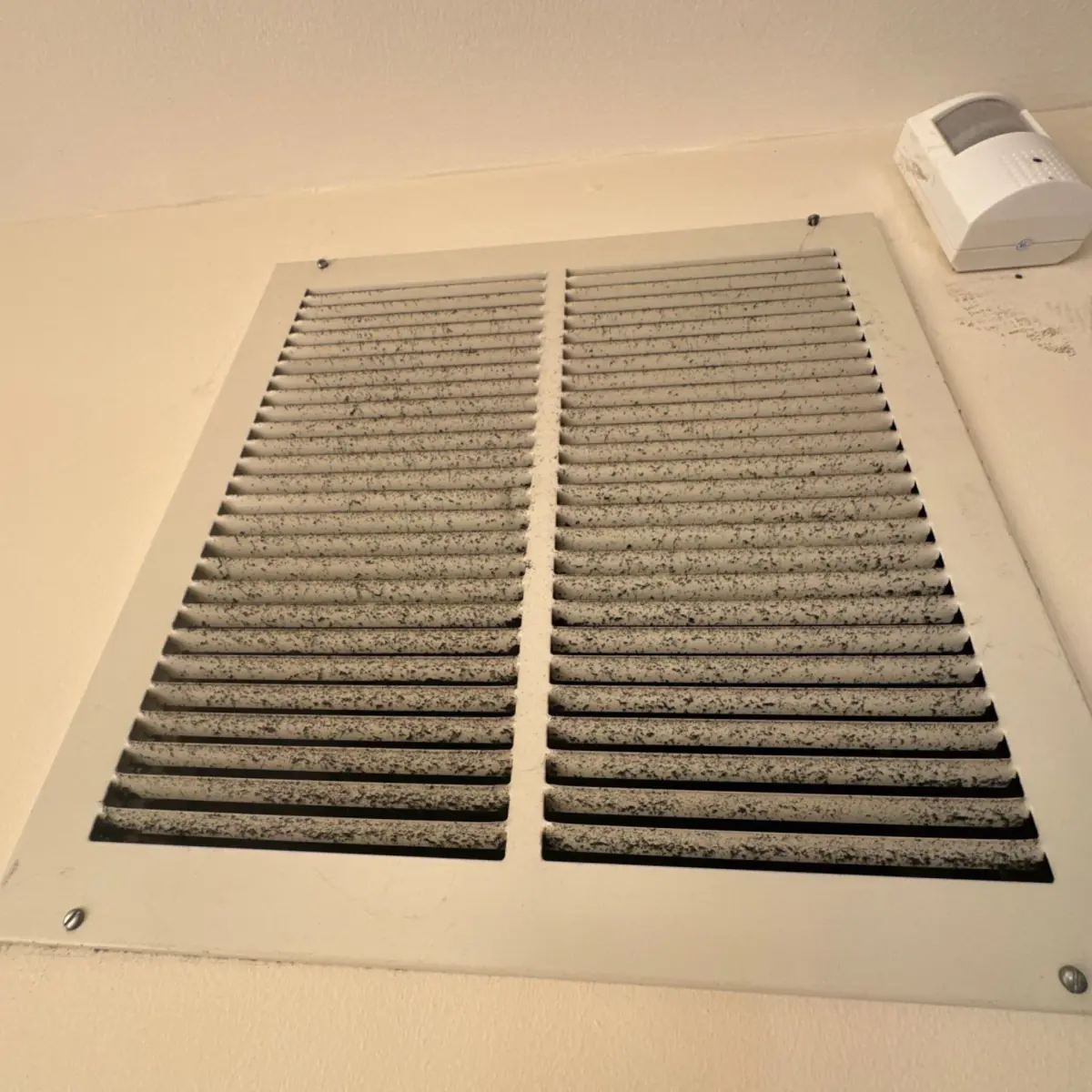 soot buildup on HVAC vents in home on Long Island before clean up.