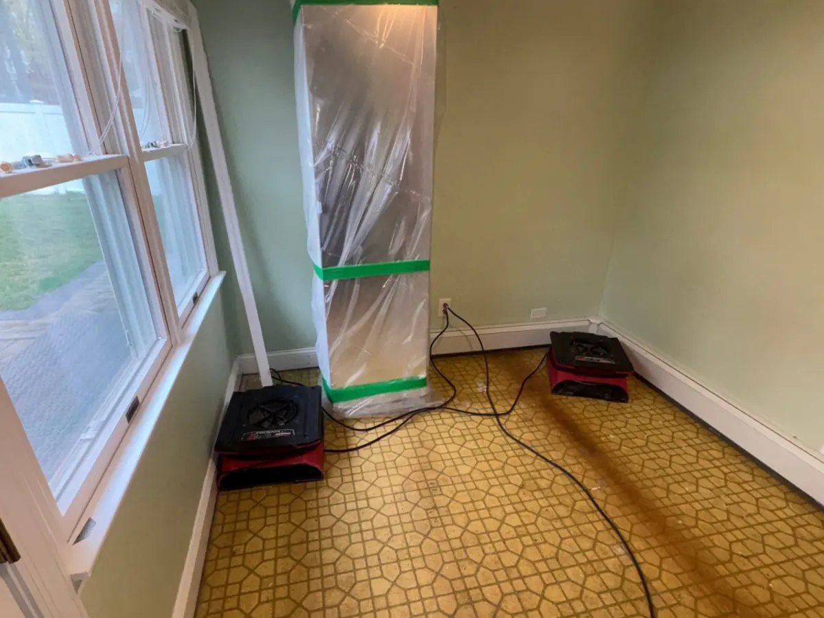 Drying and dehumidifying equipment in contained area of a home in Stony Brook NY