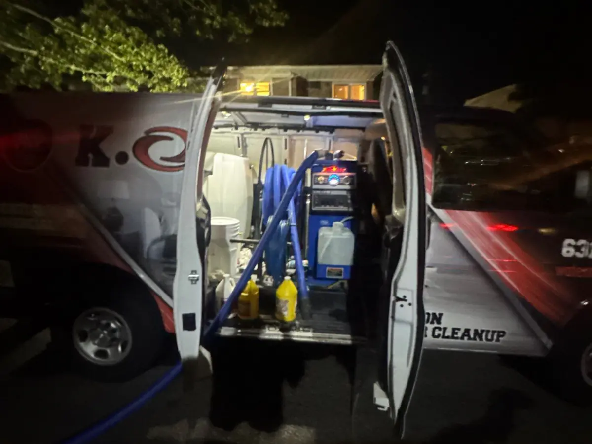 Hoses running from the K.O.S. extraction truck into the flooded condo