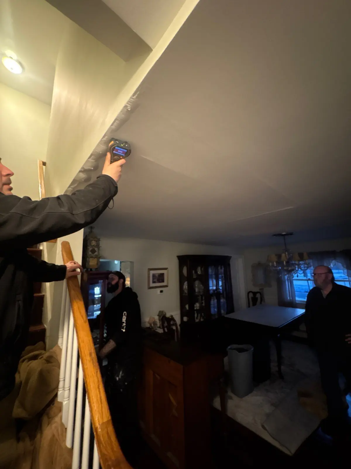 Taking moisture reading inside a home in Patchogue NY