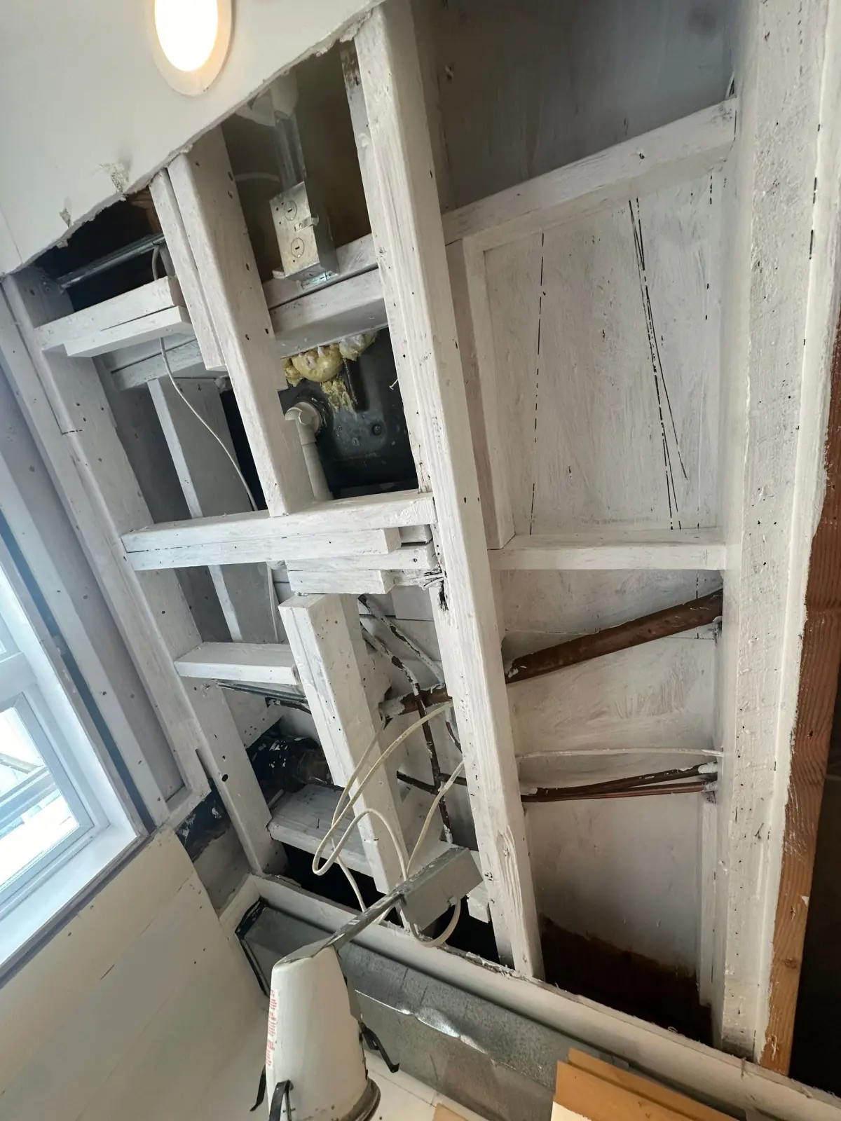 Opened wall and ceiling framing after cleaning